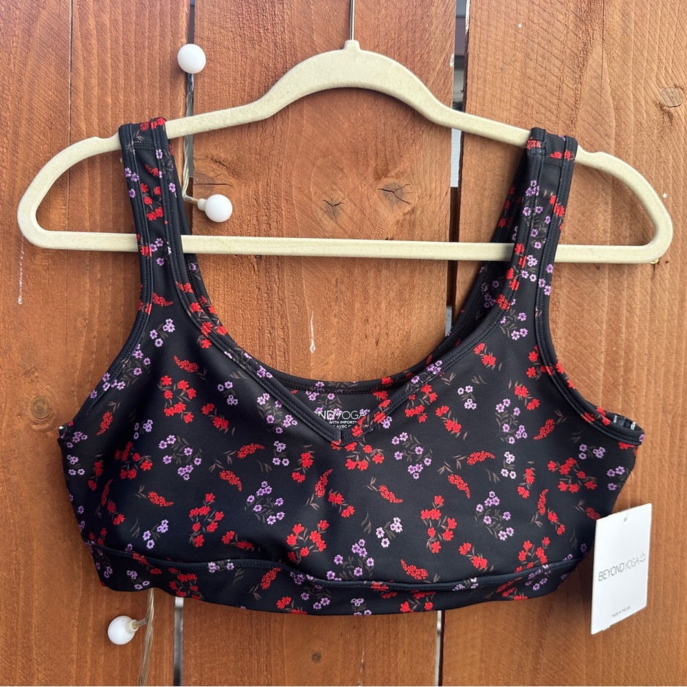 Beyond Yoga Black Sports Bra with Red and Purple Floral Design